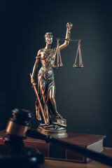 lady justice with judge gavel in front