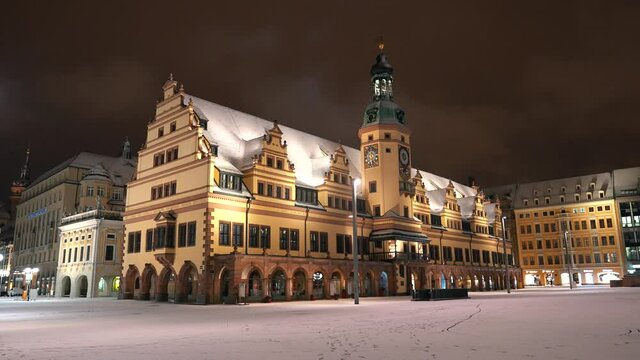 Old town Hall in the City centre of Leipzig in Saxony, Germany on a Winter night during snowfall in the dark