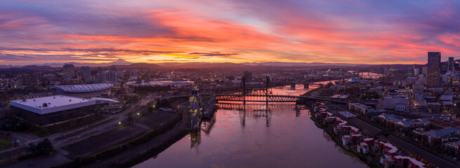 Sunrise over the Willamette River in Portland Oregon above the Steel Bridge Looking towards Mt. Hood