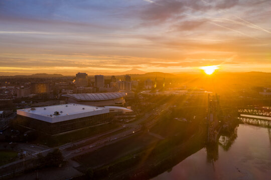 Sunrise over the Willamette River in Portland Oregon above the Steel Bridge Looking towards Mt. Hood