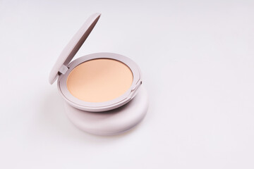 Grey plastic powder cases isolated on white background