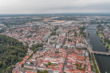 Fototapeta na wymiar Aerial drone shot of Neckar river through Heidelberg new town in overcast summer morning