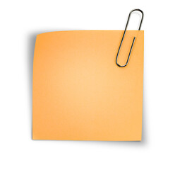 one orange sheet of paper on a paper clip on an isolated white background