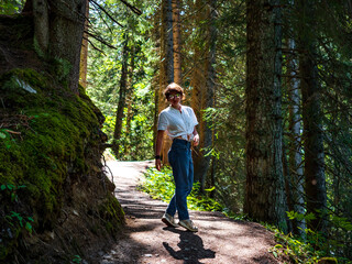 Young girl in the woods. The beauty of nature and the beauty of man.