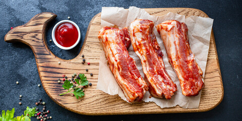 ribs raw bbq marinated barbecue sauce grill pork meat on the table meal snack outdoor top view copy space for text food background rustic image