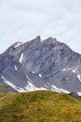 The mountains, meadows and lakes of the Aosta Valley near the town of La Thuile, Italy - August 2020.