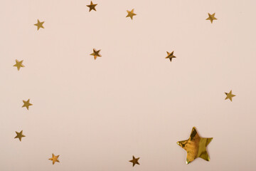 beige background with stars. Christmas. Wedding. Birthday. Flat lay