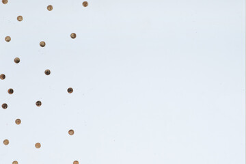 gold dots on white background