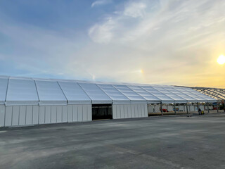 Installation of the huge tent Size 40 to 120 m under a sunny sky Suitable for all events