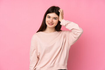 Young Ukrainian teenager girl over isolated pink background with an expression of frustration and not understanding