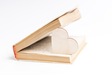 open book with heart symbol inside. love reading concept. valentine day greeting card conceptual