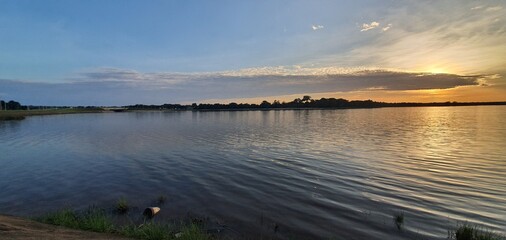 Fototapeta premium sunset over the lake