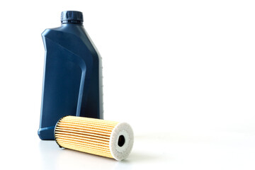 Motor oil and oil filter with copy space isolated on white background, Gallon of unbranded engine...