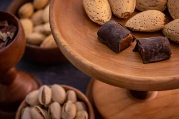 candy and nuts in wood bowl