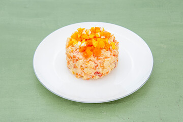 Russian salad on white plate