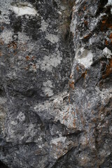 The texture of the rock. Mountain cliff of rock surface. Natural cave wall.