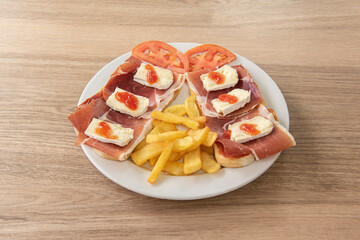 Serrano ham toast with french fries