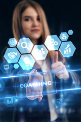 Business, Technology, Internet and network concept. Young businessman working on a virtual screen of the future and sees the inscription: Coaching