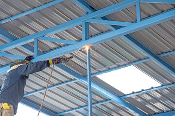 Obraz premium welder Industrial automotive part in factory