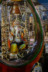 Colorful Lord Ganesha Terracotta doll dressed in traditional Indian dress, made in Krishnanagar, Nadia, West Bengal, for sale in Handicraft Fair in Kolkata. Biggest handicraft fair in Asia.