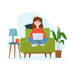 Obraz na płótnie Canvas A woman works on a laptop on an armchair. Work from home concept. Freelance concept.