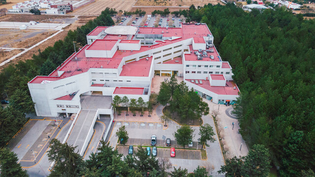 Aerial photography of a hospital in Mexico, the building is distinguished along with the parking lot and the different offices. 2