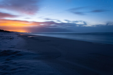 Fototapeta na wymiar moonless night on the beach, Baltic Sea, January