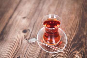 A cup of Turkish black tea on the table