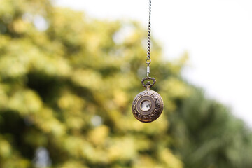 vintage pocket watch with zodiac engraving
