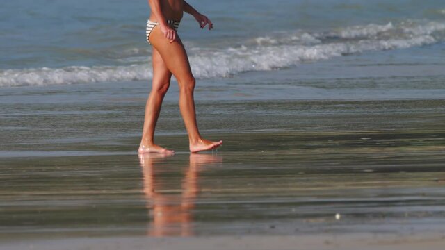 Barefoot beach walking