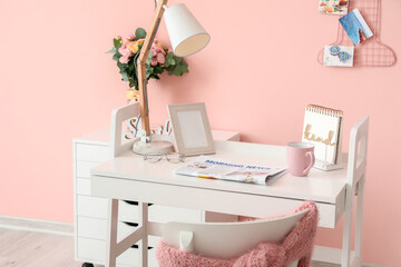 Stylish interior of workplace in room