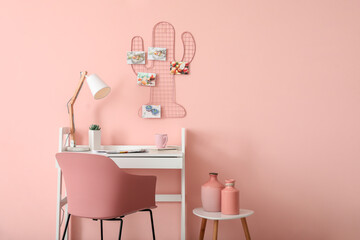 Stylish interior of workplace in room