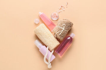 Fototapeta na wymiar Spa composition with bath sponges on color background
