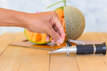 Drop the juice of fresh melon for test sweet level