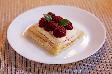 luxurious dessert with raspberries for New Year's dinner