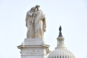Statues in mourning in front of the Capitol building in the National Mall, Washington DC
