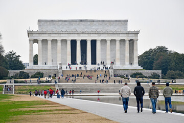 Tourists and residents enjoying a mild winter day at the Lincoln memorial in the National Mall, Washington DC