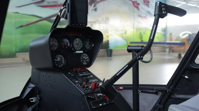 helicopter Robinson R44 parked in the hangar