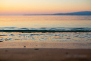 Obraz premium Sea water close-up at sunset