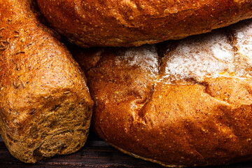 Crispy, freshly baked rye bread close-up. Rustic style. Food Background