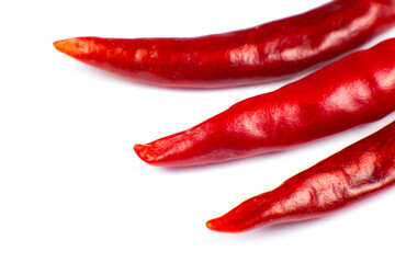 Red hot chili peppers on white background. Close up.