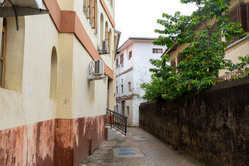 Streets in heart of Stone Town Zanzibar which mostly consists of a maze of narrow alleys lined by houses