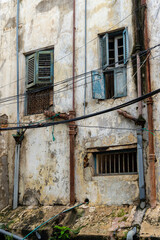 Fototapeta na wymiar Streets in heart of Stone Town Zanzibar which mostly consists of a maze of narrow alleys lined by houses
