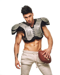 Shirtless american football player on white background © Serge Lee