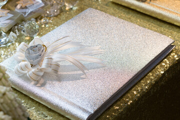 silver notebook for wishes in wedding