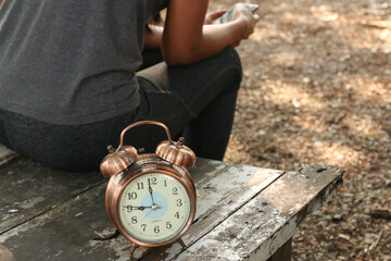 clock of waiting, a woman is waiting someting