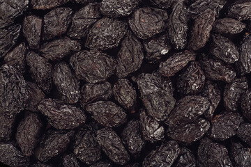 Dry fruit prunes top view for background.