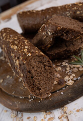 baguette black bread with seeds. freshly baked food