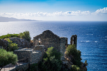 Fototapeta premium Ruins of a house on the hill located by Nonza, Corse, France