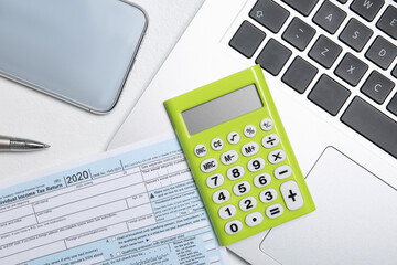 Flat lay composition with calculator and document on white table. Tax accounting